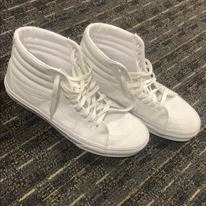 All white Vans High Tops